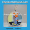 Modern design ceramic trivet with butterfly painting for wholesale